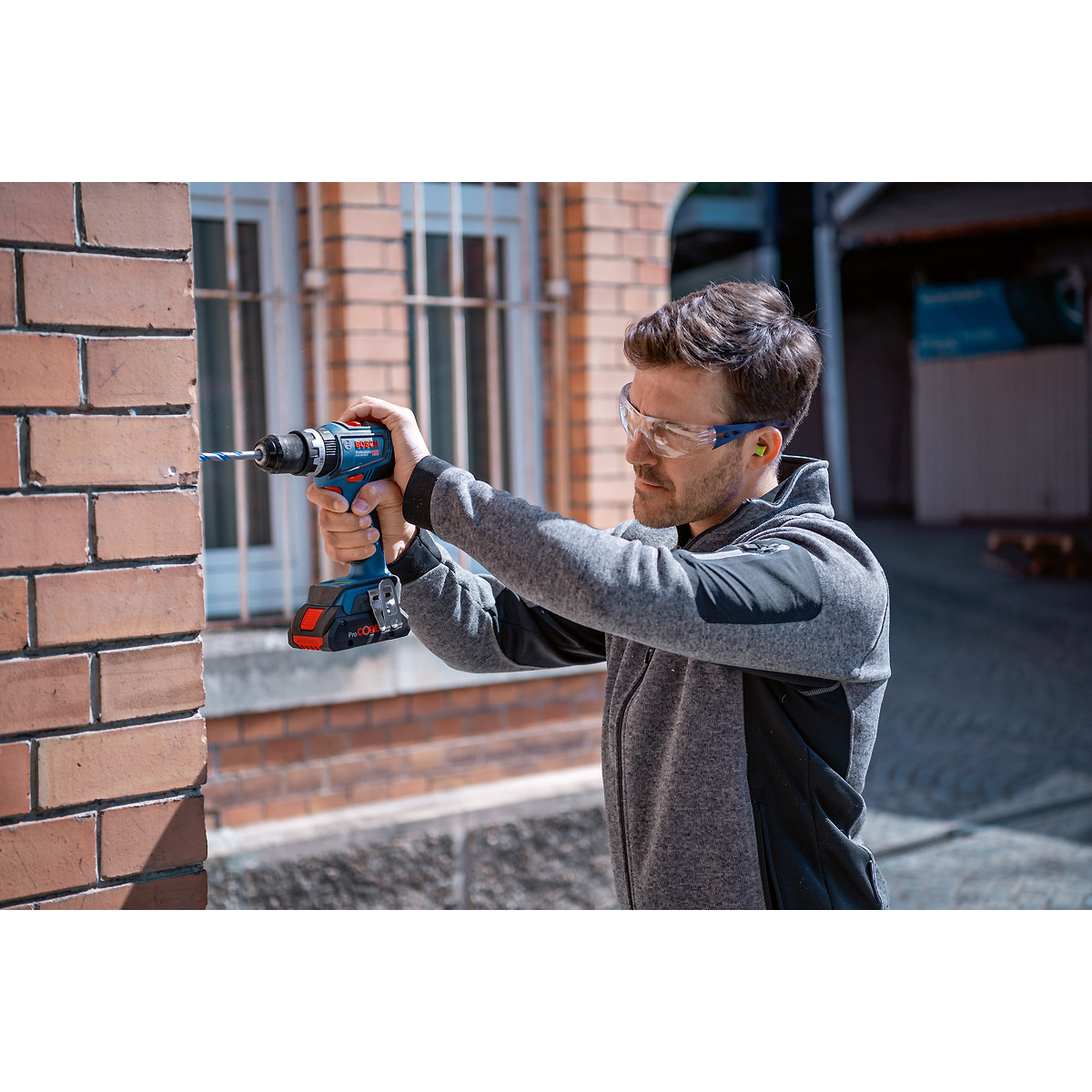 Bosch Schlagbohrschrauber GSB 18V-90C in L-BOXX 136 mit 2 x Li-Ion-Akku 4,0 Ah, Schnellladegerät